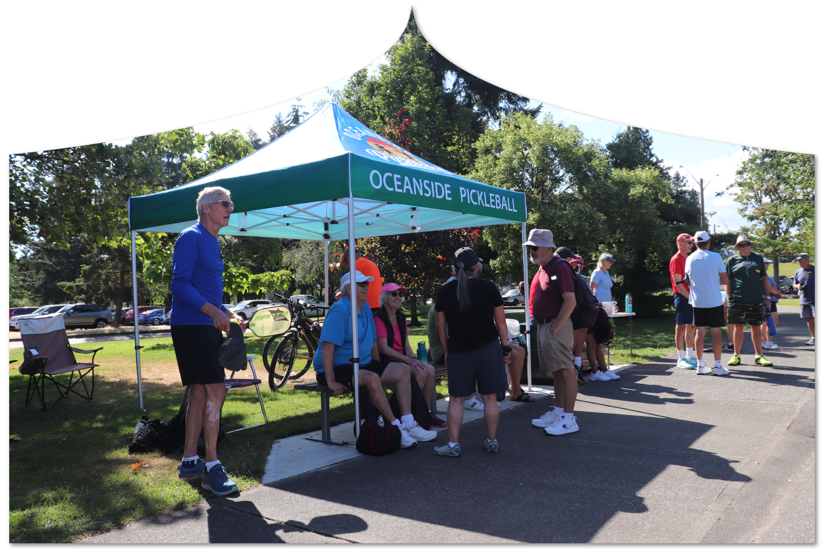 Oceanside Pickleball players at tent taking break 