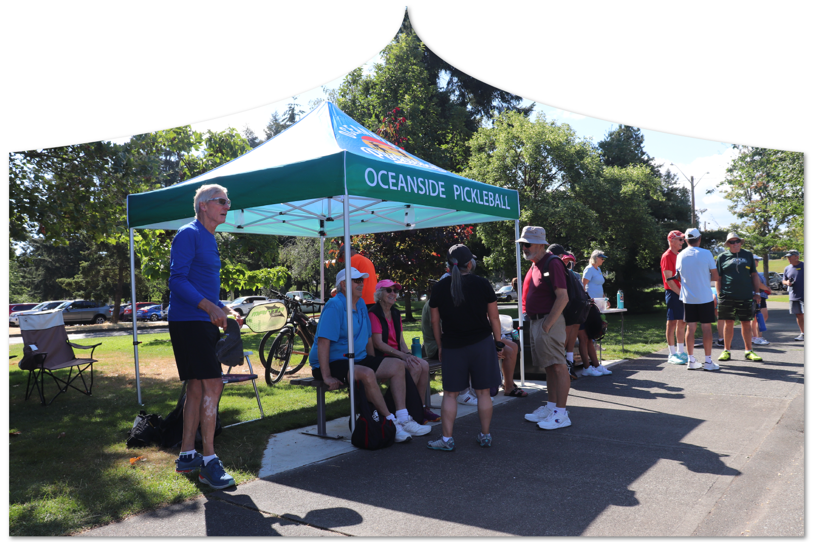 Oceanside Pickleball players at tent taking break 