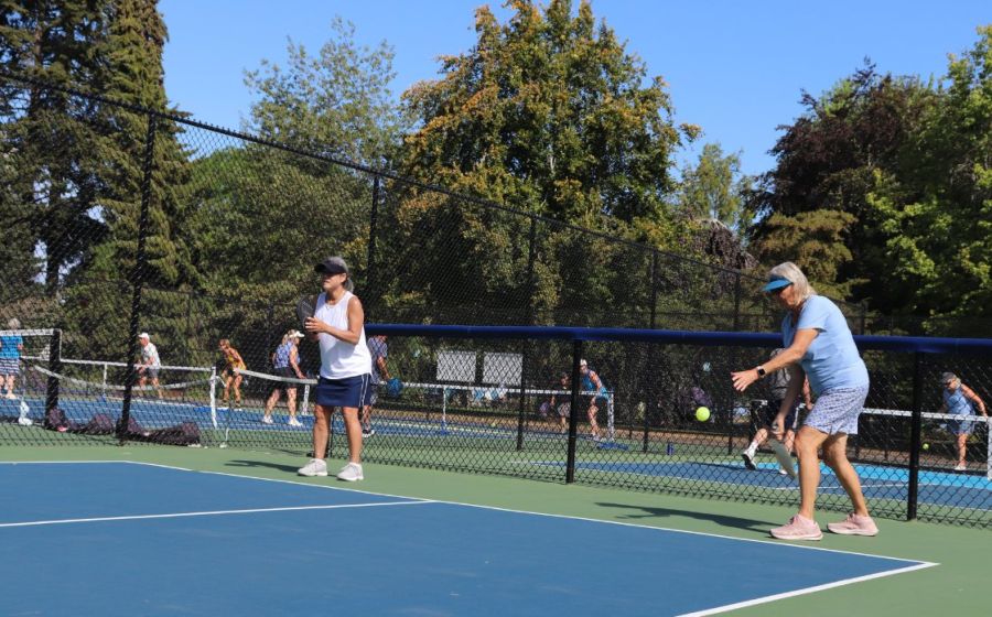 Players doing pickleball drill skills.